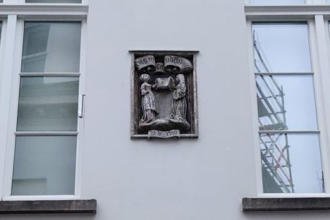 Stone work is set into a recently renovated exterior.