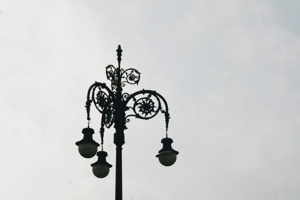 Close up of the top part of the lamp, and the globes