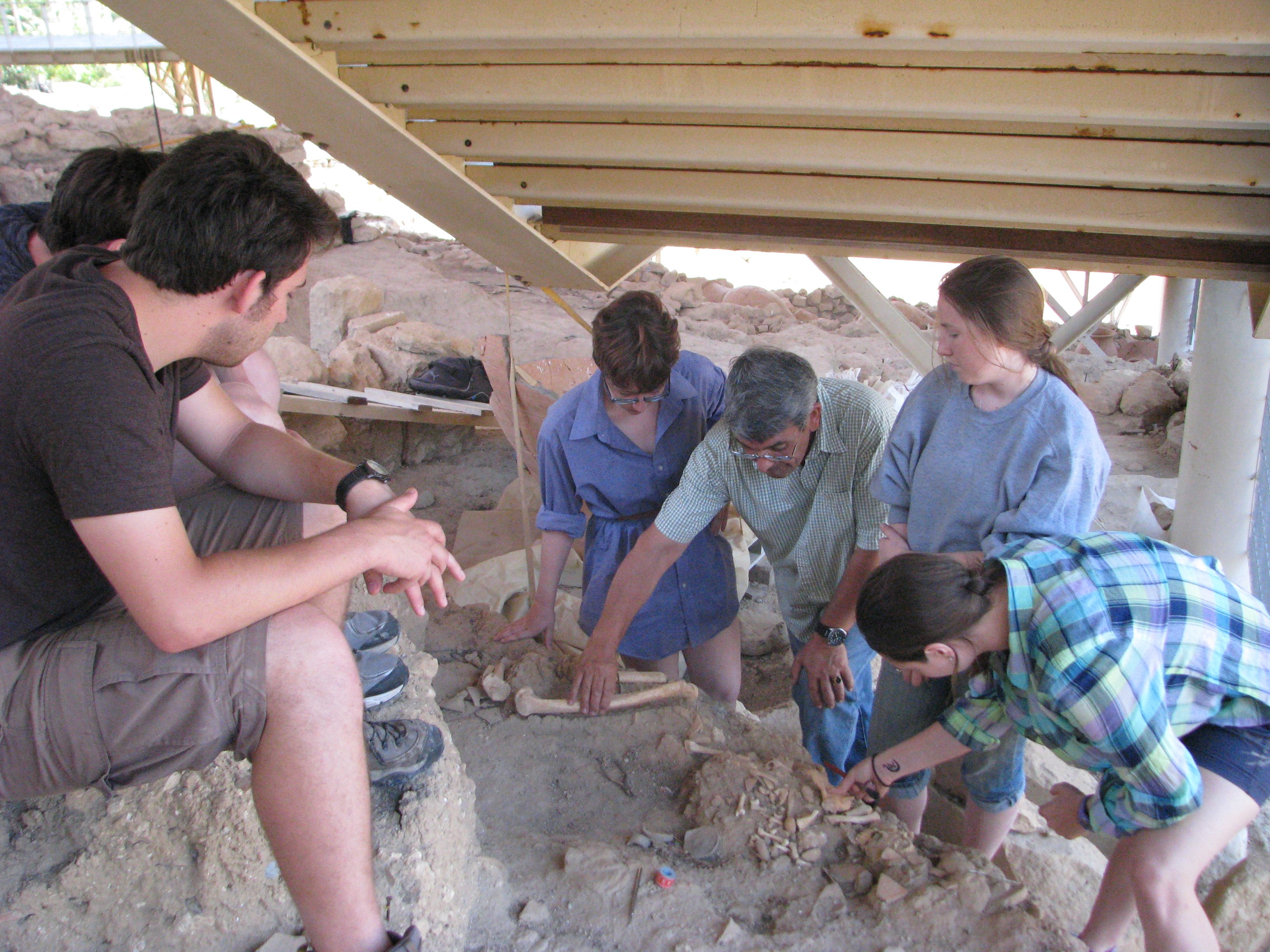 Agelarakis and student researchers working with remains at the Eleutherna site.