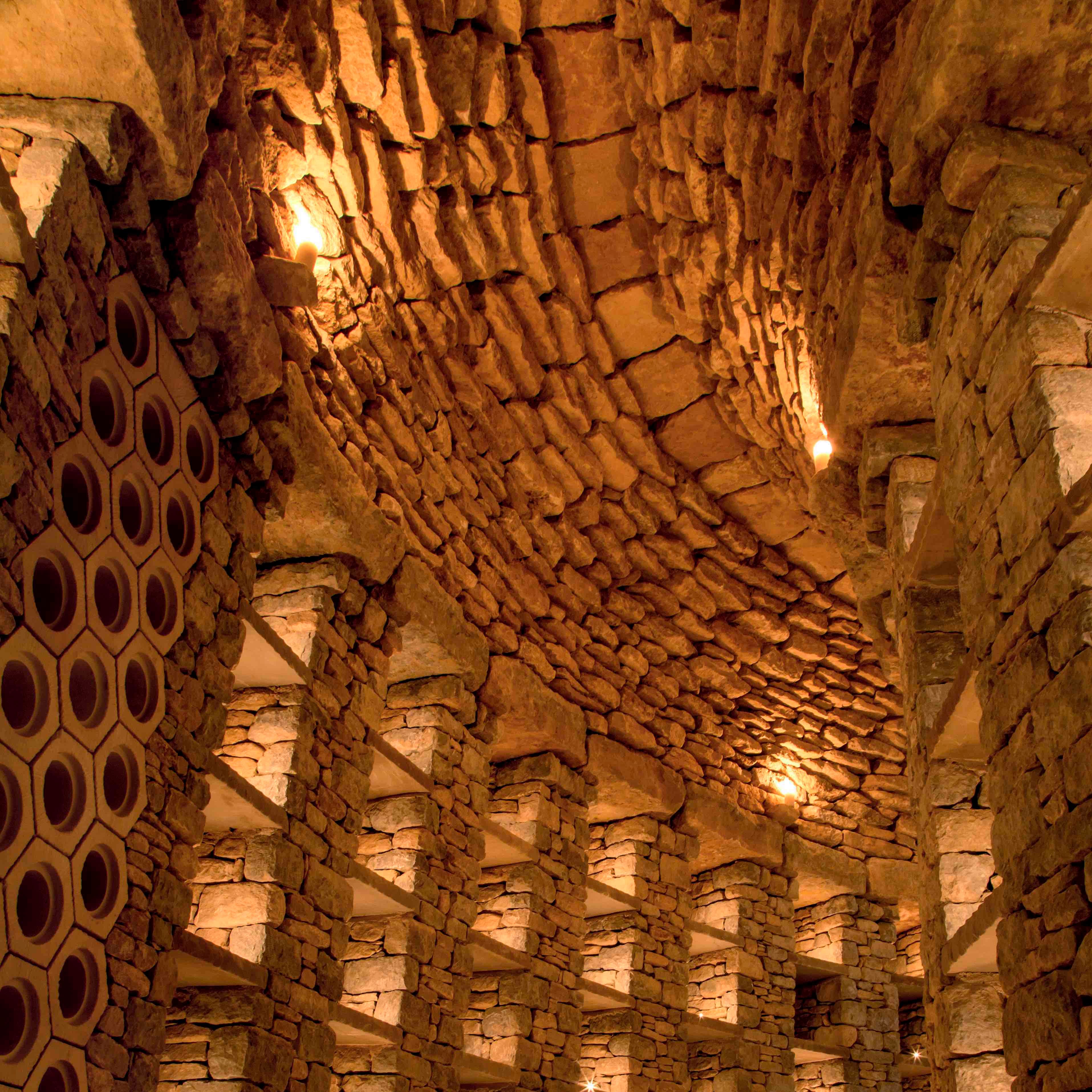 The interior of a modern Sacred Stones barrow, with individual "niches" for hosting cremated remains.