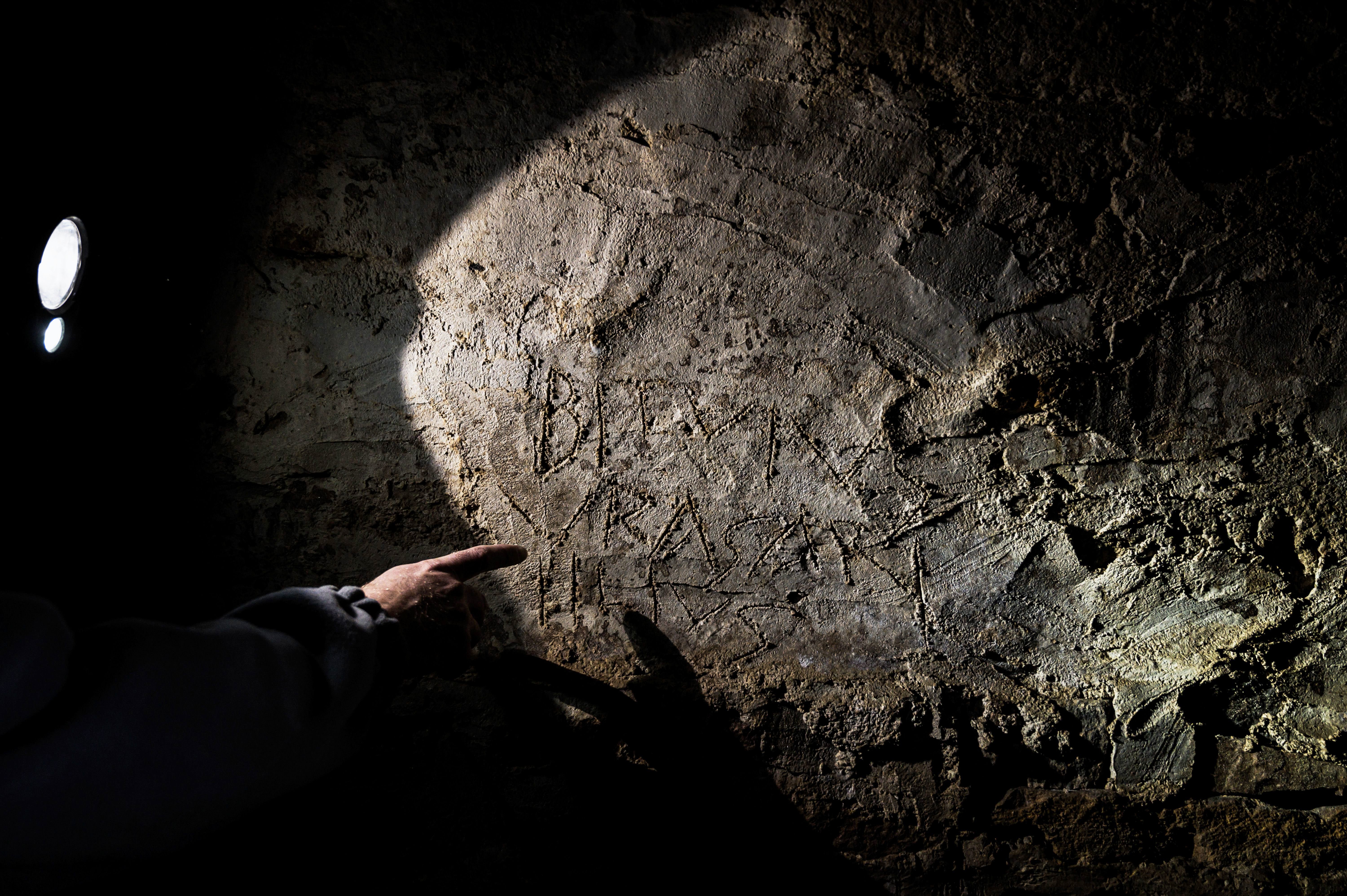 Dating the tunnels was a challenge, but alongside years of graffiti, archeologists found Roman inscriptions:.
