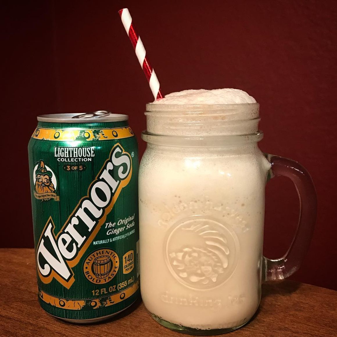 A Boston Cooler in a glass mug beside a can of Vernor's Ginger Ale. From Gastro Obscura, image from TMWDDP