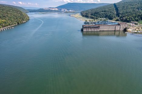 An aerial photo of the Tennessee River and the remains of a former dam.