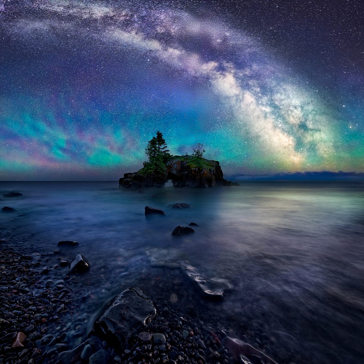 Long exposures can be key to capturing the grandeur of the Milky Way, seen here at Hollow Rock in Lake Superior off the coast of Minnesota. 