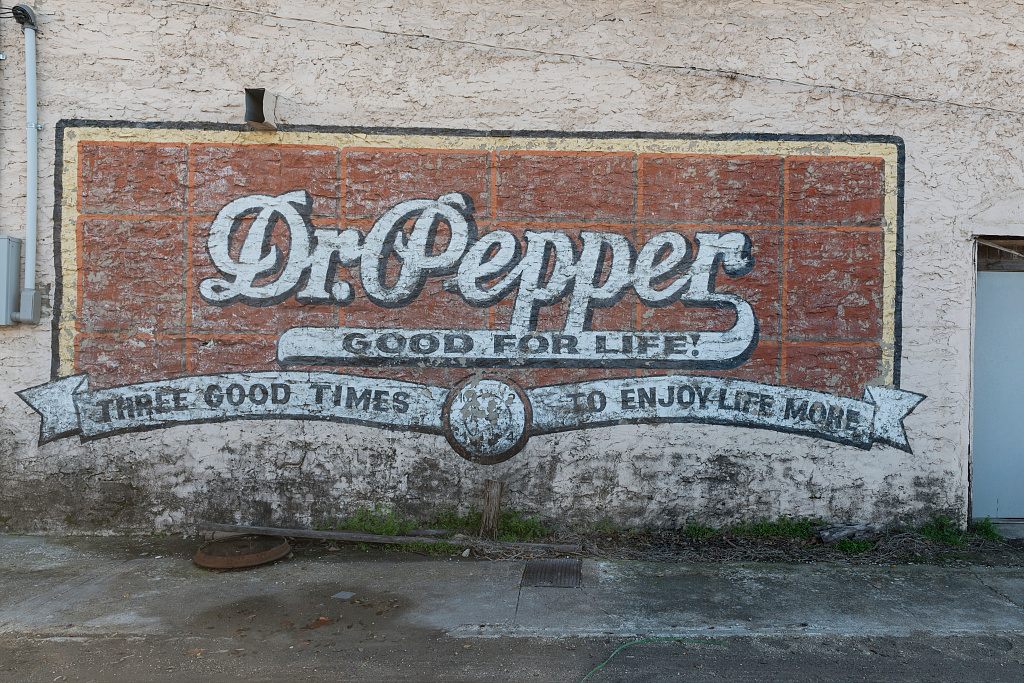 Old Dr Pepper mural on a building in the town of Hico in Hamilton County, Texas