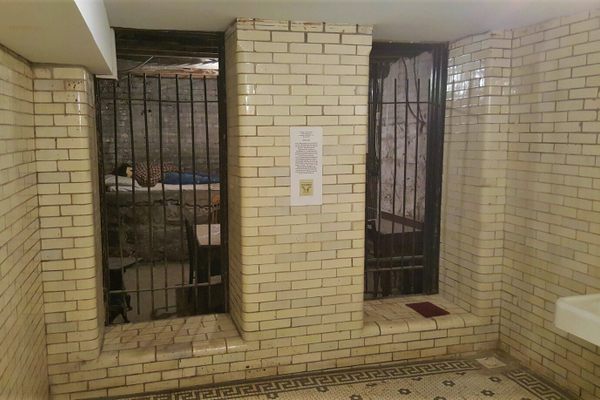 The basement jail cell, with its rare yellow bricks.