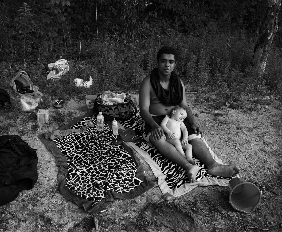A family hangs out on the beach.