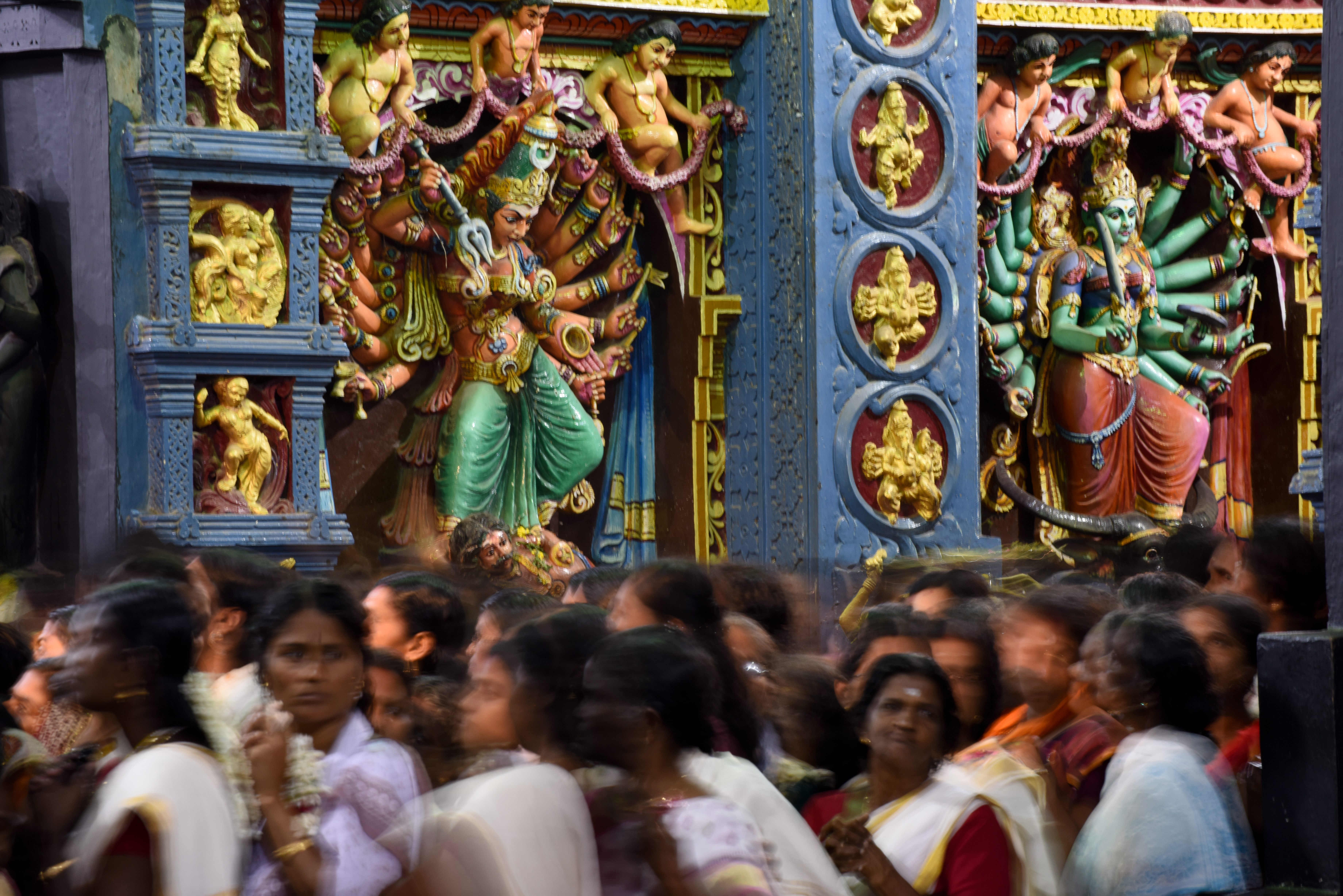 Women pass by the the temple on the ninth day of Attukal Pongala.