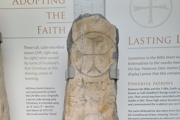 Stone with Biblical verse “Alpha and Omega”