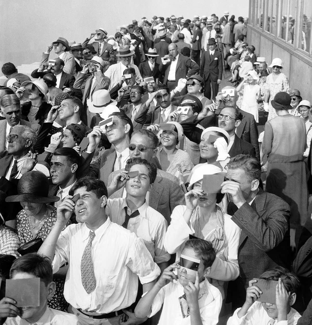 Eclipse watchers at the Empire State Building, New York, 1932.