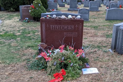 Family members and fans often leave flowers and wreaths at the grave