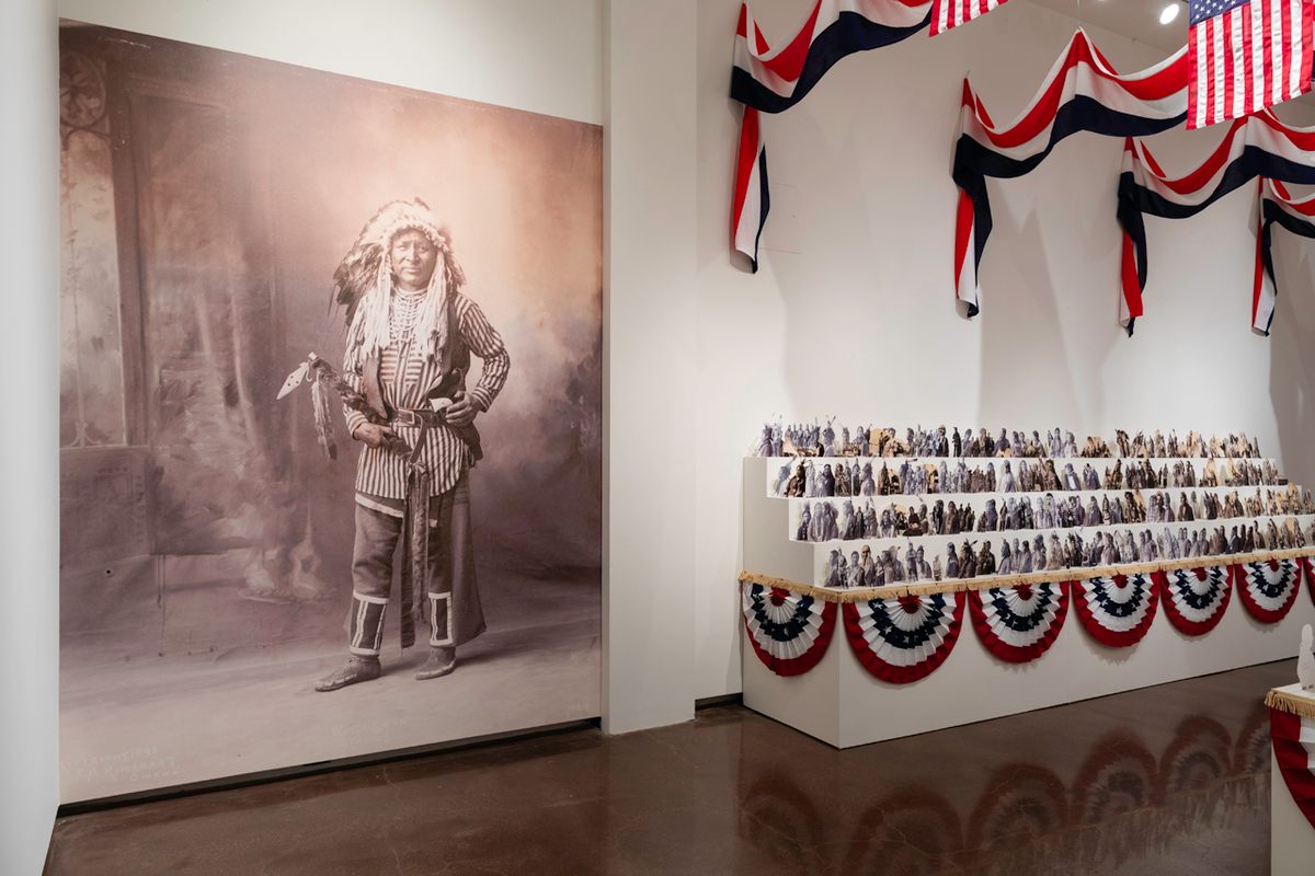 White Swan, of the Crow nation, is presented in a larger portrait.
