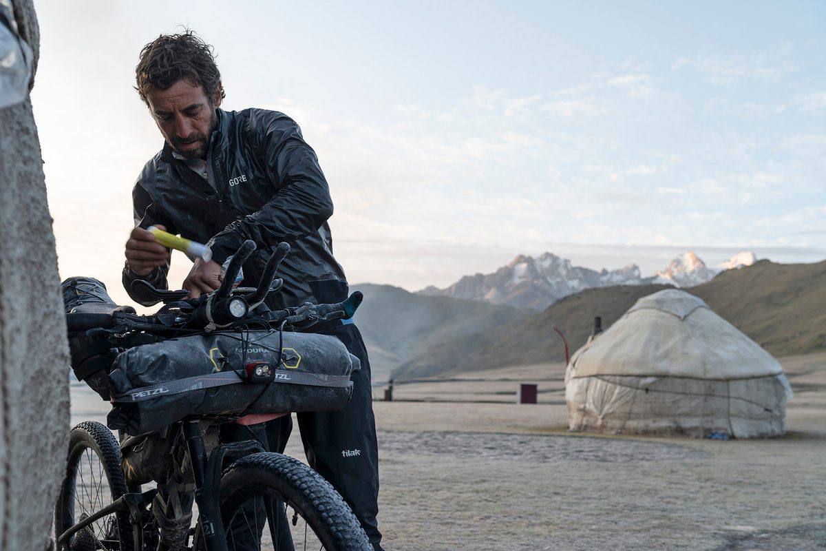 Martin Písačka from the Czech Republic packs his equipment before heading out of a checkpoint.