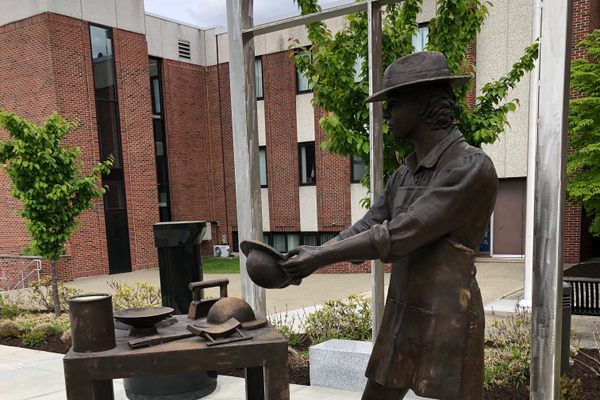 The Hat Maker statue