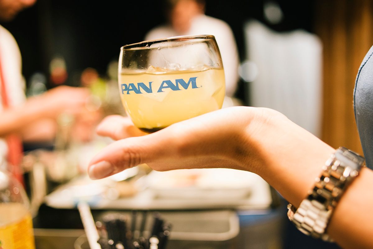 Enjoying the drinks service on board the Pan Am Experience.