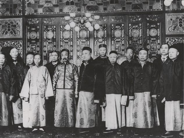Early officers of San Francisco's Six Companies in traditional Qing dress, pictured around 1900.