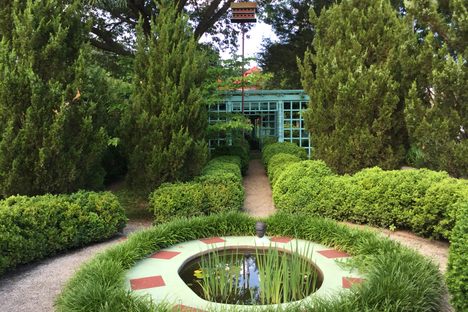 The pond at the back of Anne Spencer's garden. The small bust on the edge of the pond was a gift from W.E.B. Du Bois.