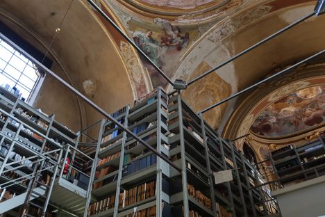 Metal shelves reach the high heavens