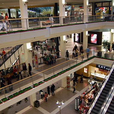 Three levels of shopping stacked on top of one another, built above the world's largest underground aquarium, and centered around a full-blown indoor amusement park.
