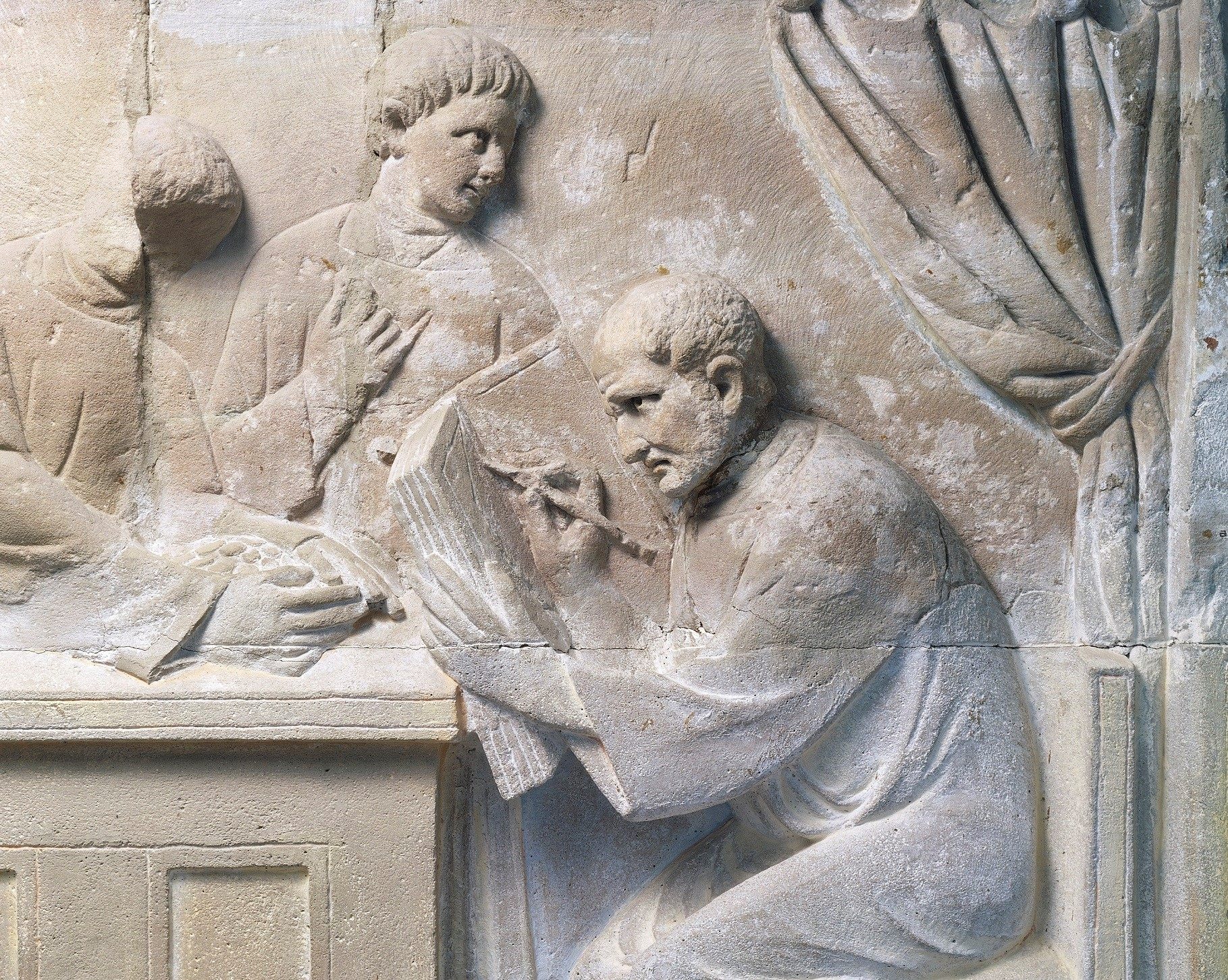 Relief of a Roman tax collector. The ability to collect taxes from ancient outposts was one reason for the rise of surnames.