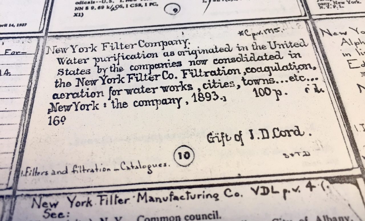 Fancy handwriting on a catalog card from the New York Public Library.