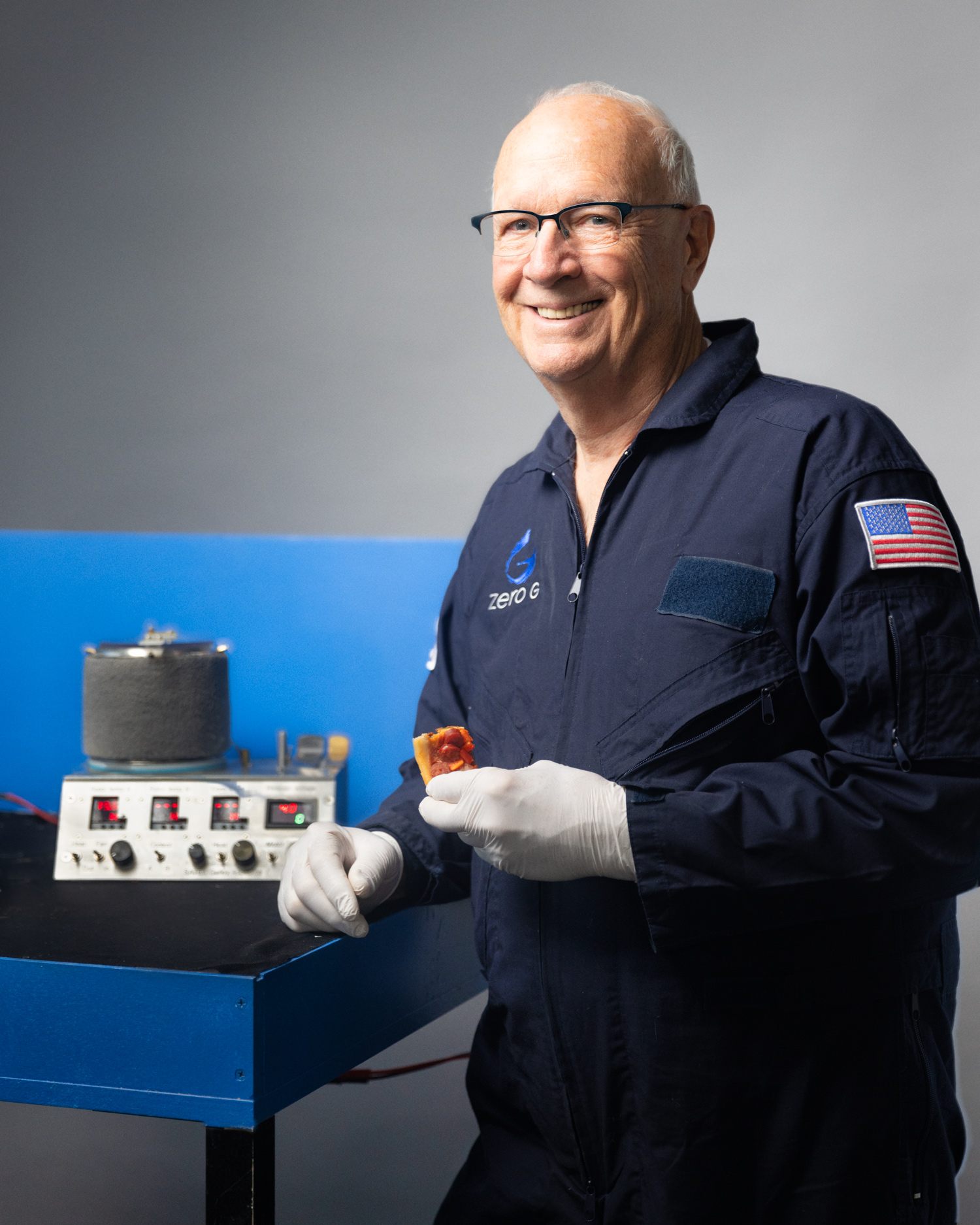 Jim Sears poses with his SATED oven.