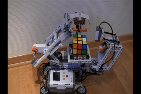 Watch This Orange-Mustached LEGO Robot Solve a Rubik's Cube 