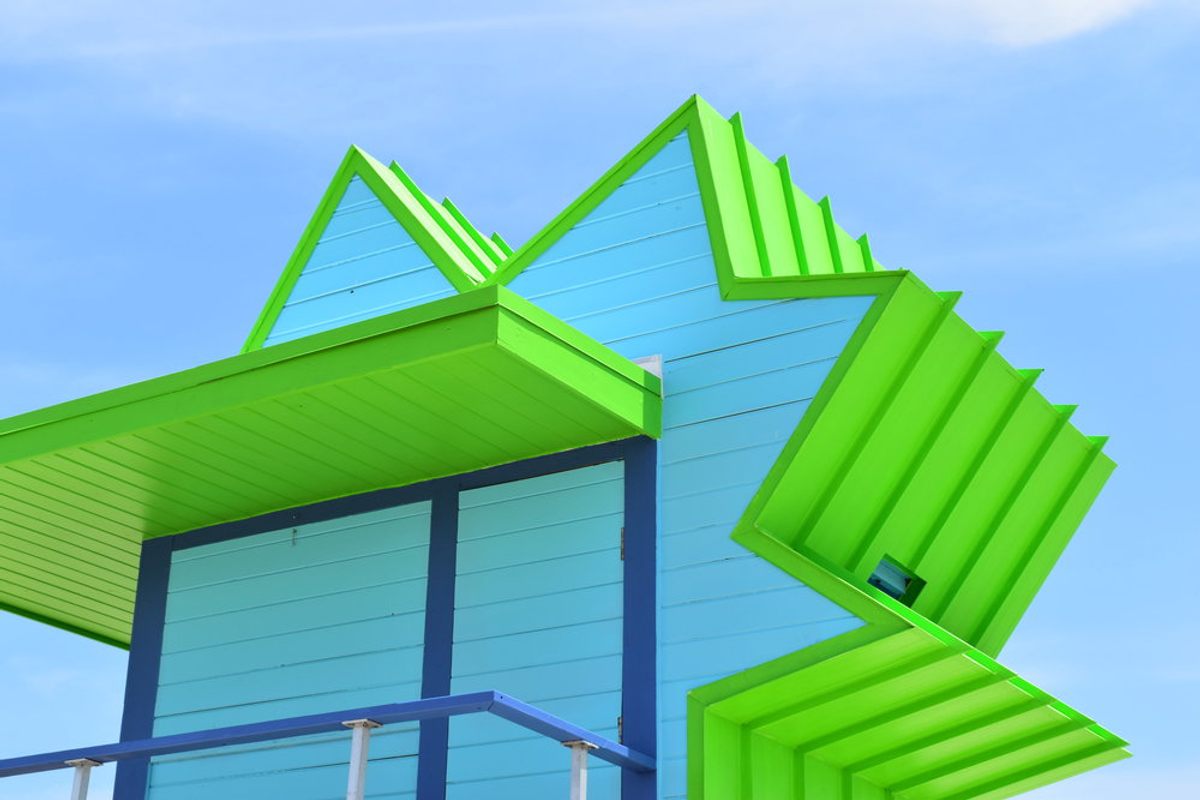 The structures are painted in a rainbow of hues, all of them practically fluorescent.