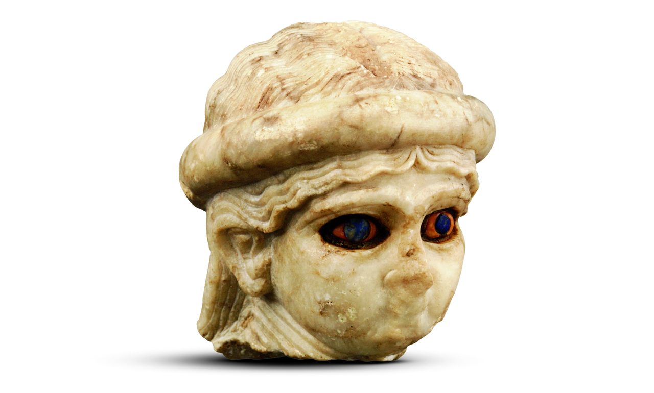 Archaeologists believe this head belonged to a figurine representing a high priestess of Ur. 