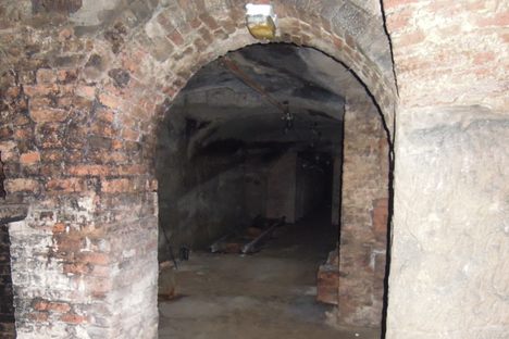 Brick supports hold the crumbly cave up.