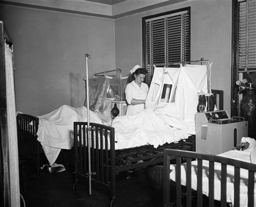  A smog victim recovers in an oxygen tent at Charleroi-Monessen Hospital.
