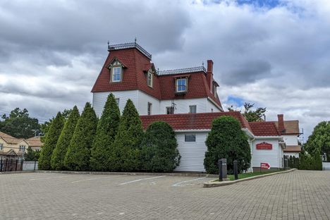 The house viewed from its parking lot