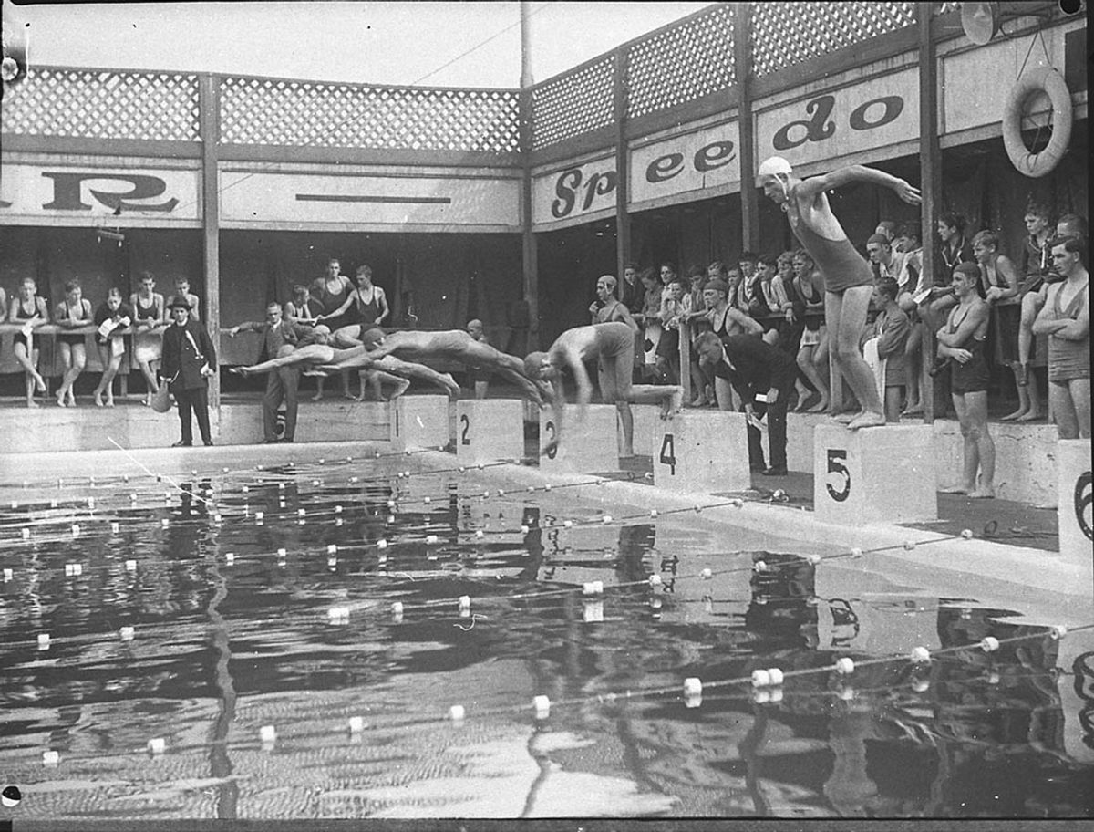 The start of a relay race, with Speedo advertising in the background, Drummoyne, Sydney, 1935.