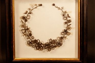One of the "fancy craft" Victorian hair wreaths in the collection of the Colorado Springs Pioneers Museum. Photo by Noel Black.