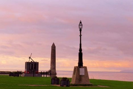 The SS Clyde Memorial with the Chaine Memorial Tower beyond it.