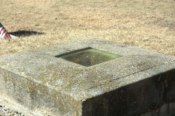 Timothy Clark Smith took no chances, and had a window installed at his grave site.