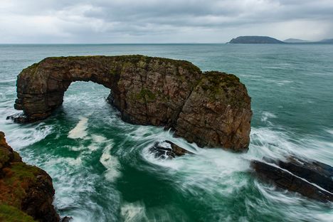 Water moves through the arch