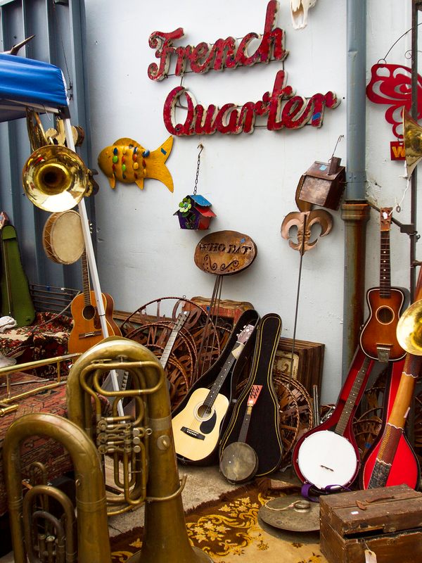 Musical instruments in the courtyard of SecondLine Arts and Antiques in New Orleans' French Quarter. 