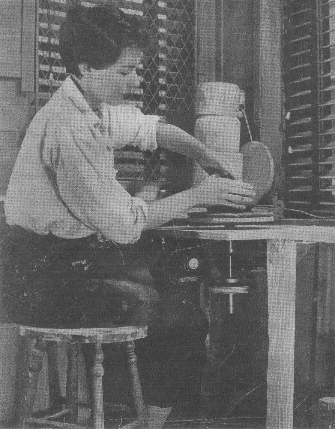 Jean Shepard at her pottery wheel, circa 1950-1956.