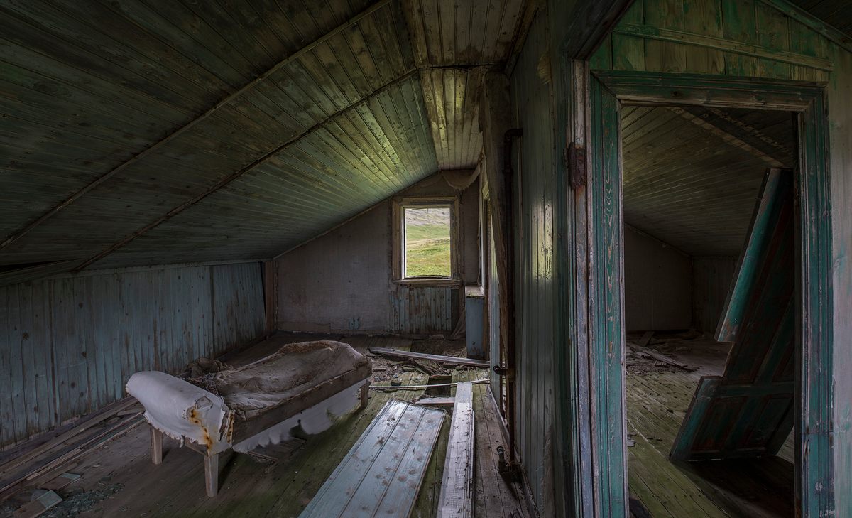 Inside an abandoned farm house.