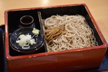 A simple box of soba noodles with aburaage (fried tofu), the foxes’ favorite food.
