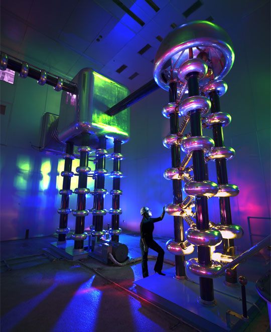 The Cockcroft-Walton Generator at Fermilab generates the high voltage necessary for accelerating particles through the Tevatron.