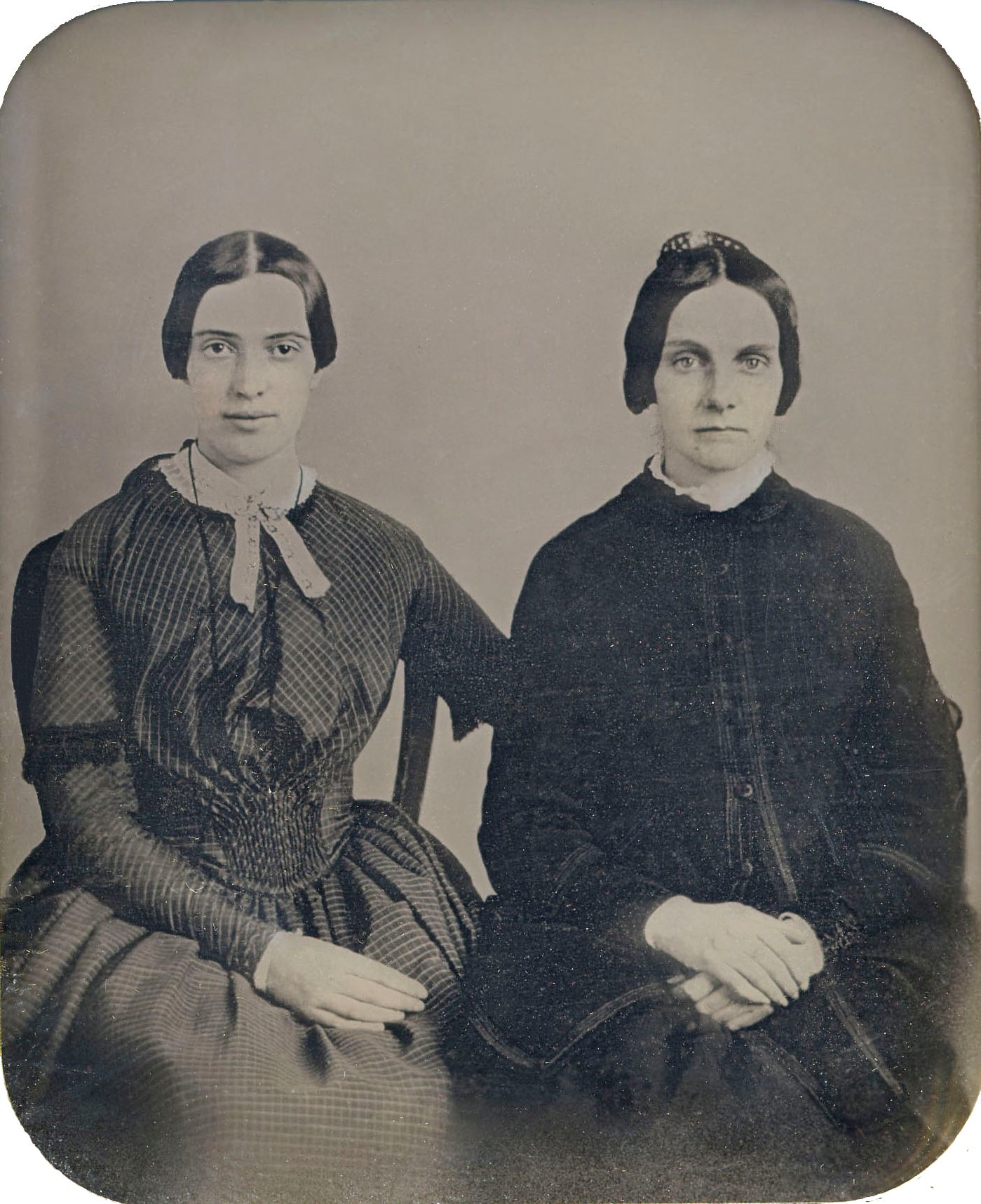 Amherst College Archives and Special Collections, which has a substantial Dickinson collection, unveiled this daguerrotype in 2012, arguing that it pictures Dickinson with her friend Kate Scott Turner. It has not been verified as a genuine image of Emily.