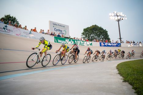 Cyclists race on the track at the Valley Preferred Cycling Center (a.k.a. The Lehigh Valley Velodrome). 