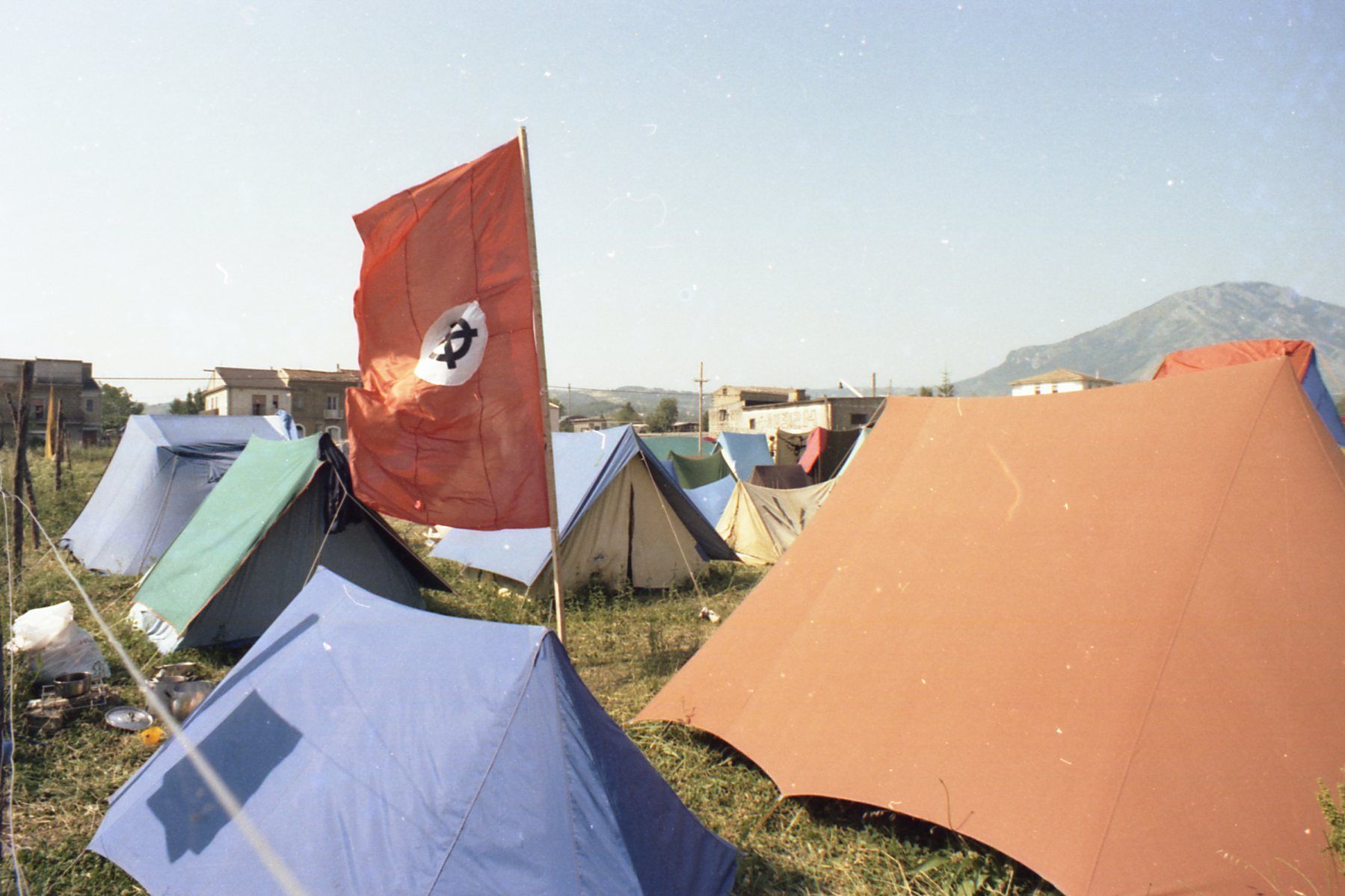 The tent city at Camp Hobbit. The celtic cross, used here on a banner based on the Nazi flag, became a symbol of the movement emerging from Camp Hobbit.