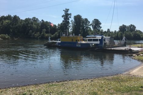 Docked.  Note the upper cable to which the ferryboat is tethered.