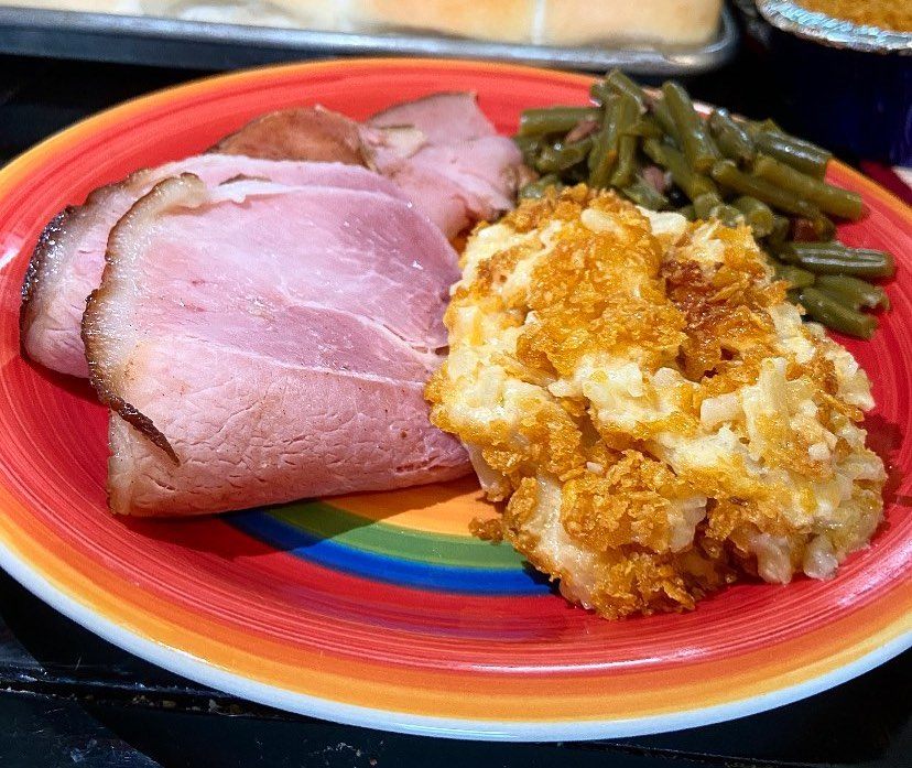 Funeral potatoes with ham and green beans.