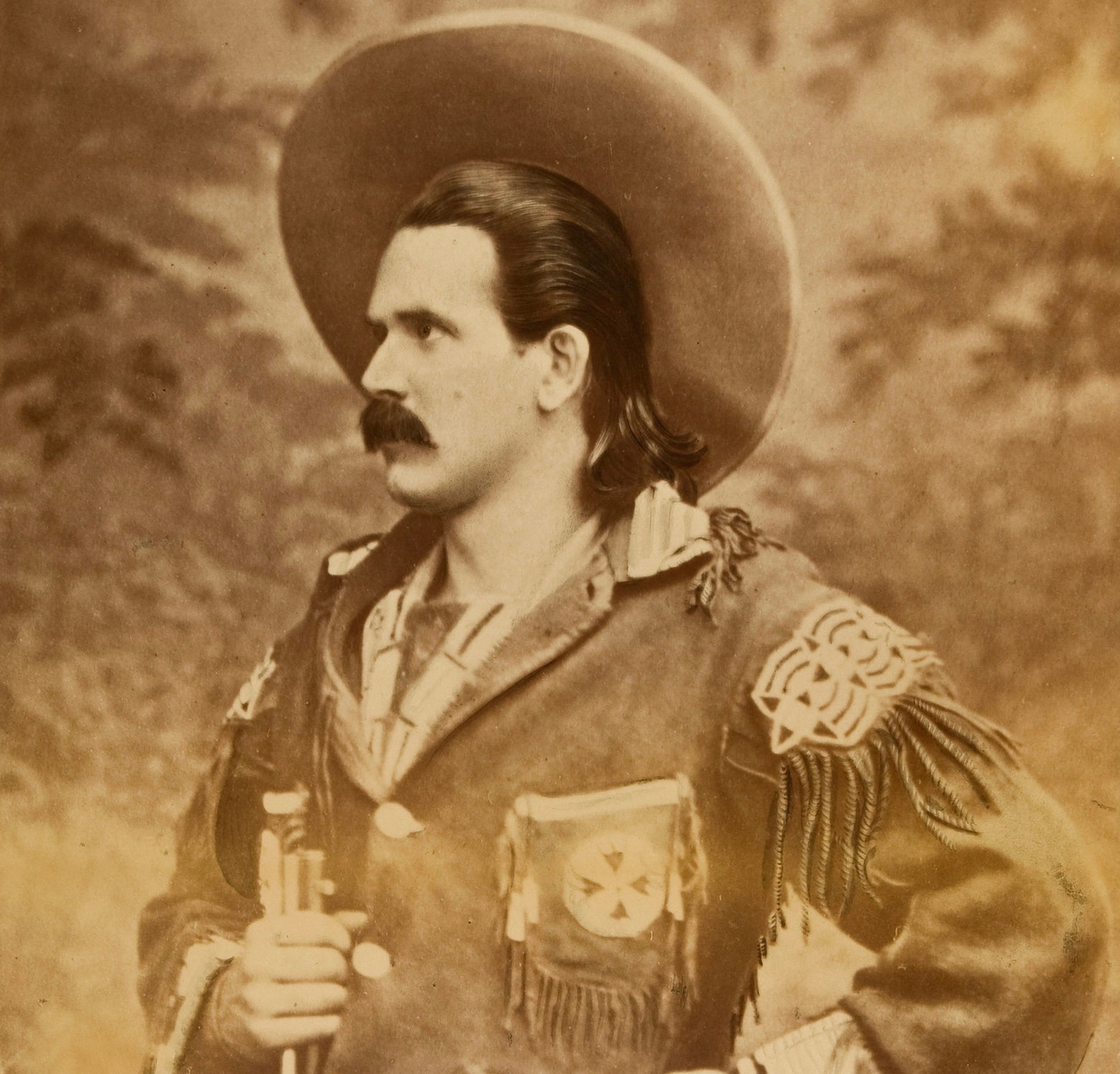 Doc Carver, in full Wild West sharpshooter regalia.