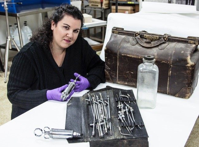 Anna Dhody, working with other remains.