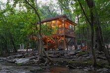 The Kilimanjaro Safari Treehouse is situated high above the creek at Four Fillies Lodge.